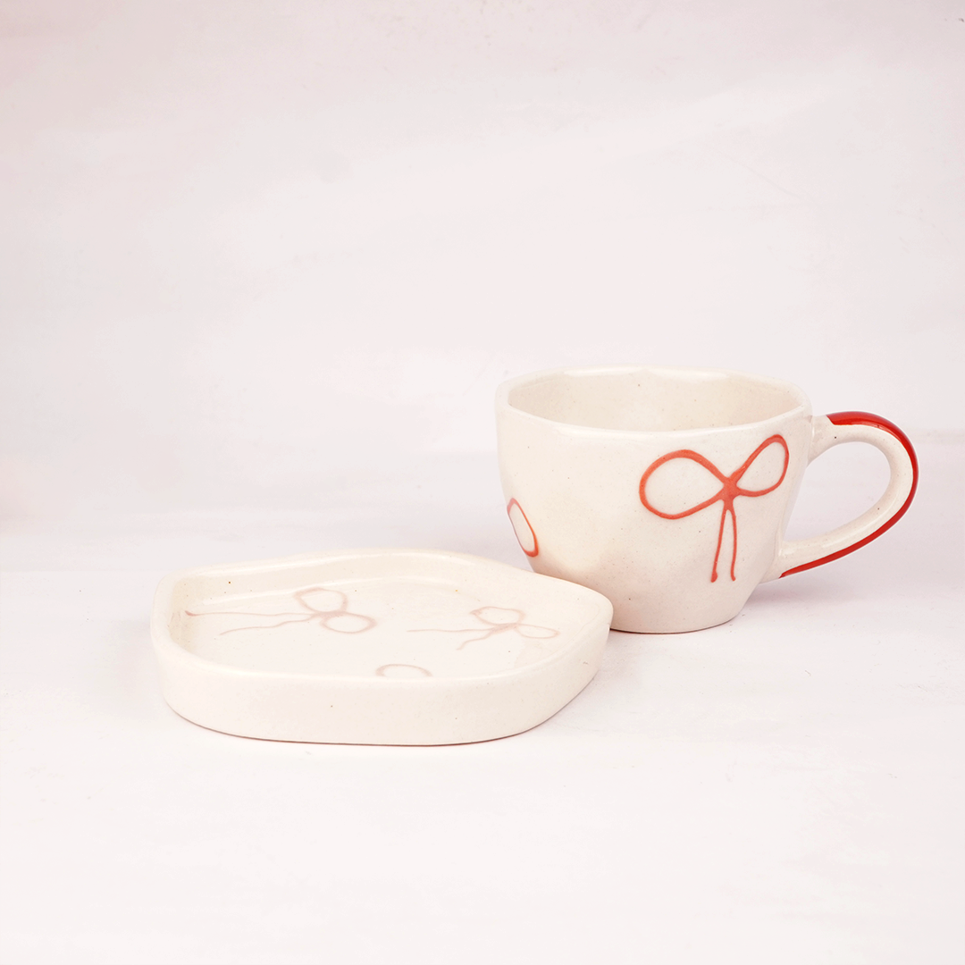 Cream Ceramic Cup & Saucer with Red Bow Design – Cute Aesthetic Tea & Coffee Mug Set