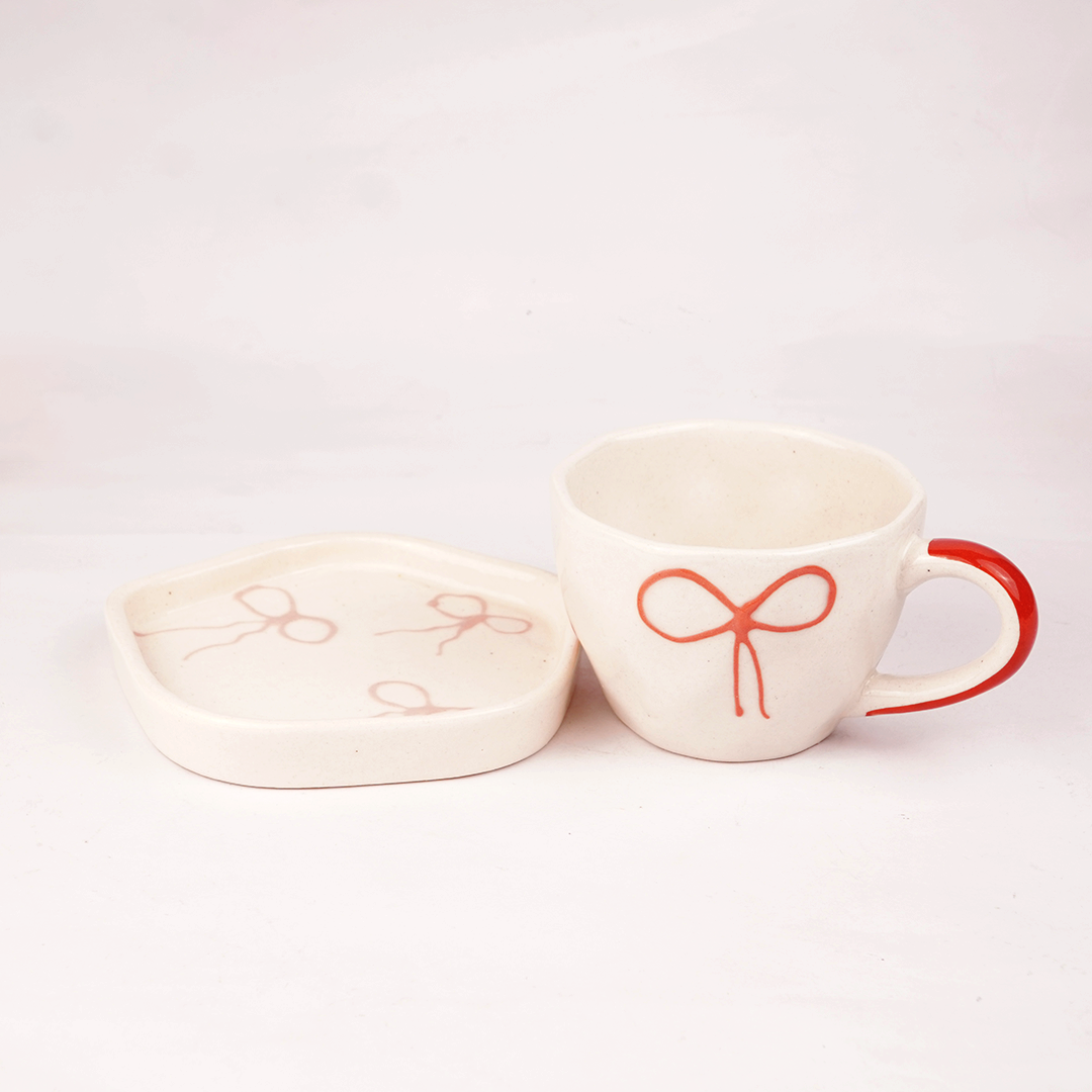 Cream Ceramic Cup & Saucer with Red Bow Design – Cute Aesthetic Tea & Coffee Mug Set