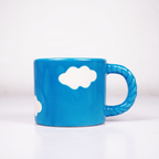 Blue Ceramic Coffee Mug with White Cloud Design & Textured Handle